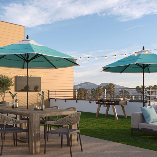 rooftop patio with seating and umbrellas