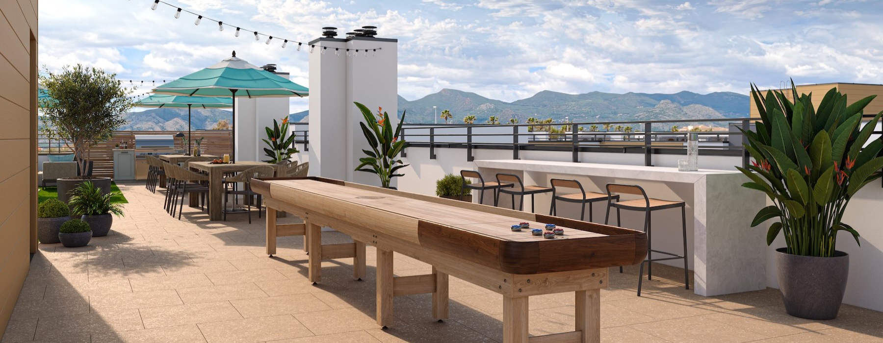 rooftop patio with a shuffleboard table seating