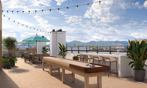 rooftop patio with a shuffleboard table seating