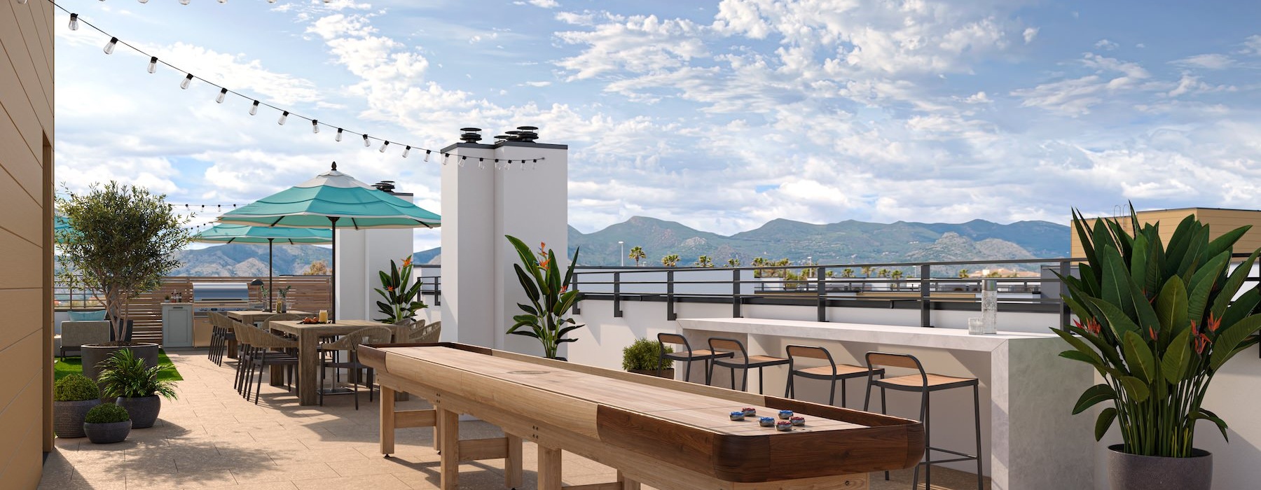 rooftop patio with a shuffleboard table seating