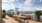 rooftop patio with a shuffleboard table seating